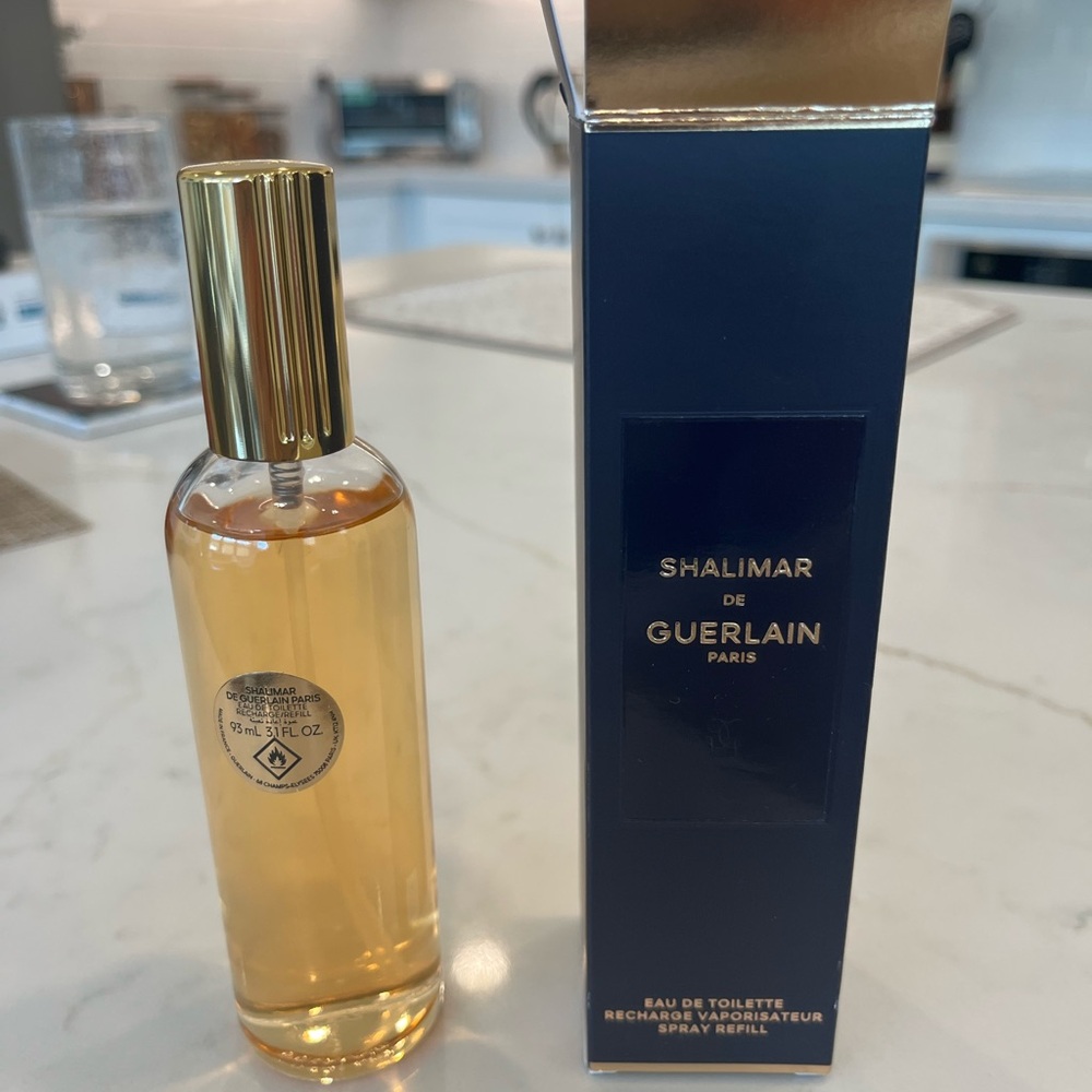NIB-Full woman’s bottle of Shalimar perfume.